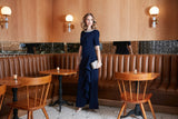 Long Embellished Neck Dress with Elbow Sleeves and Cascade Detail Skirt